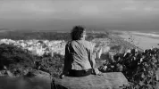 Image of Woman Looking Over City